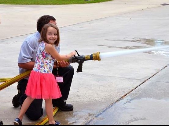 Child with Fire Hose