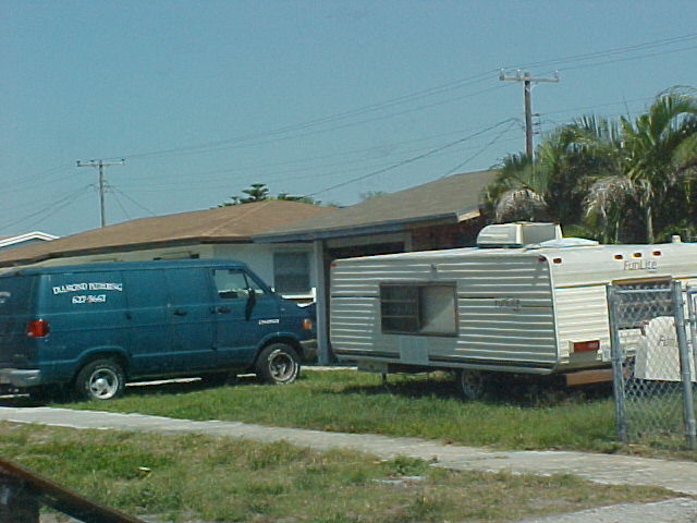 Photo of Recreational Vehicle Improperly on Lawn