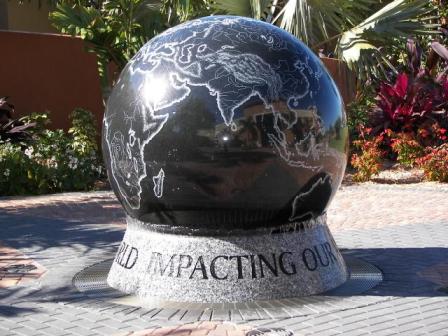 Granite globe of earth on stand