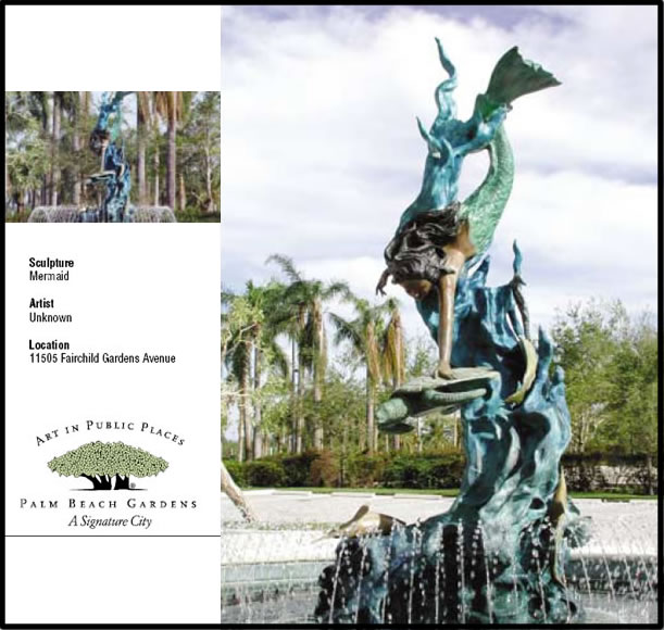 Sculpture with mermain and sea turtle and waves of water